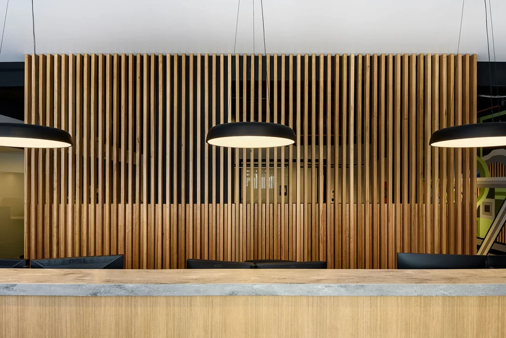 commercial office reception with timber wall cladding